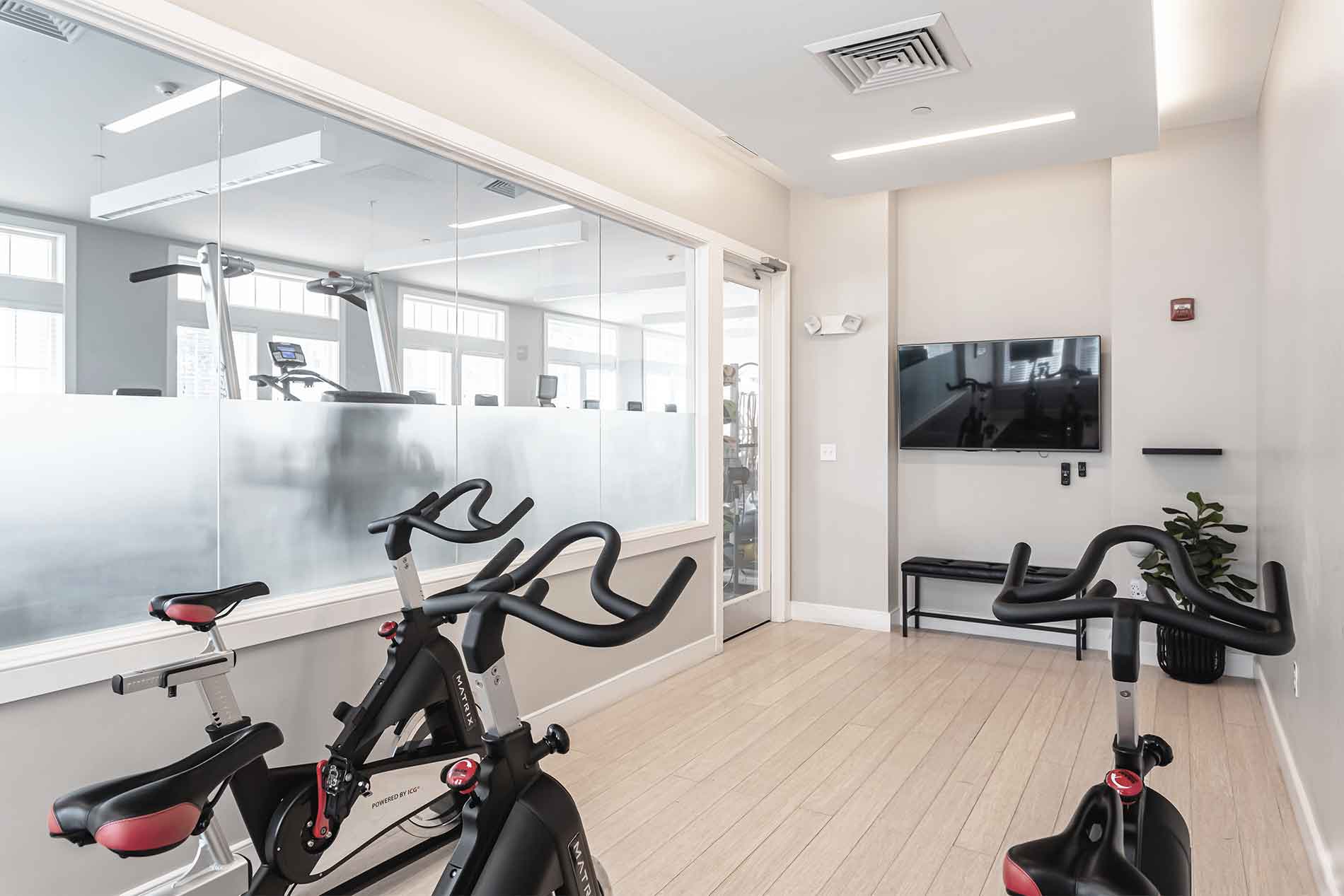 One Upland fitness center spin room with peloton bikes