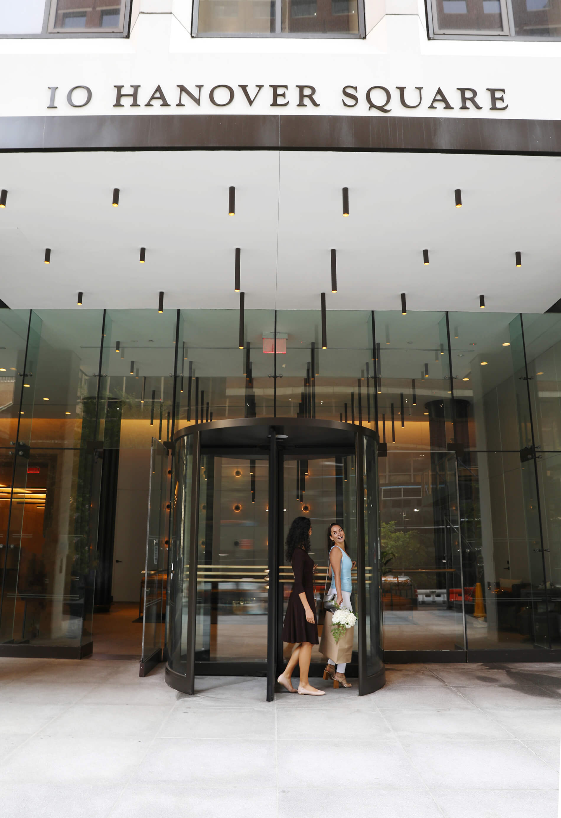 10Hanover women walk into front of building