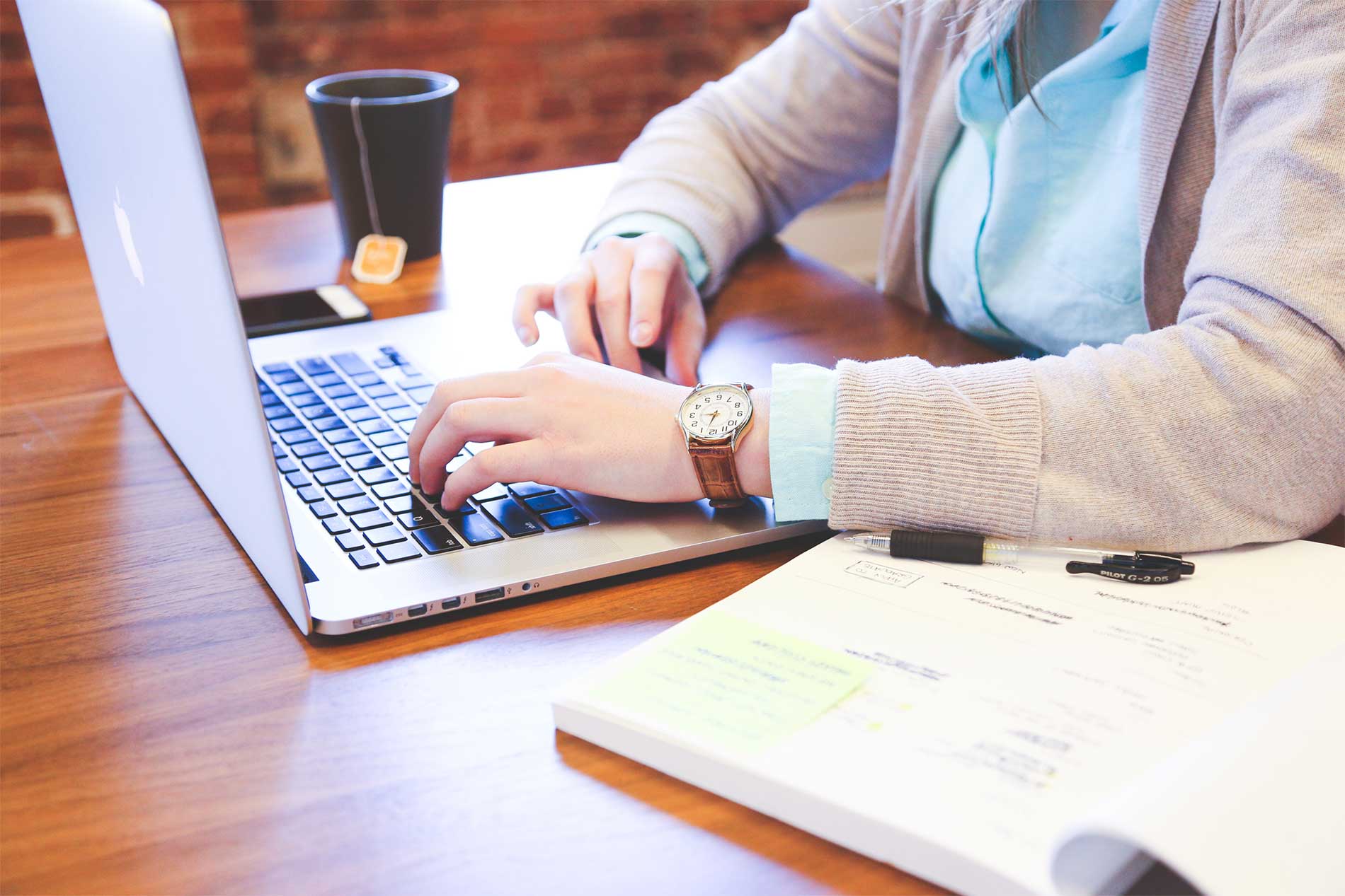 Lifestyle Woman Working on Laptop Closeup