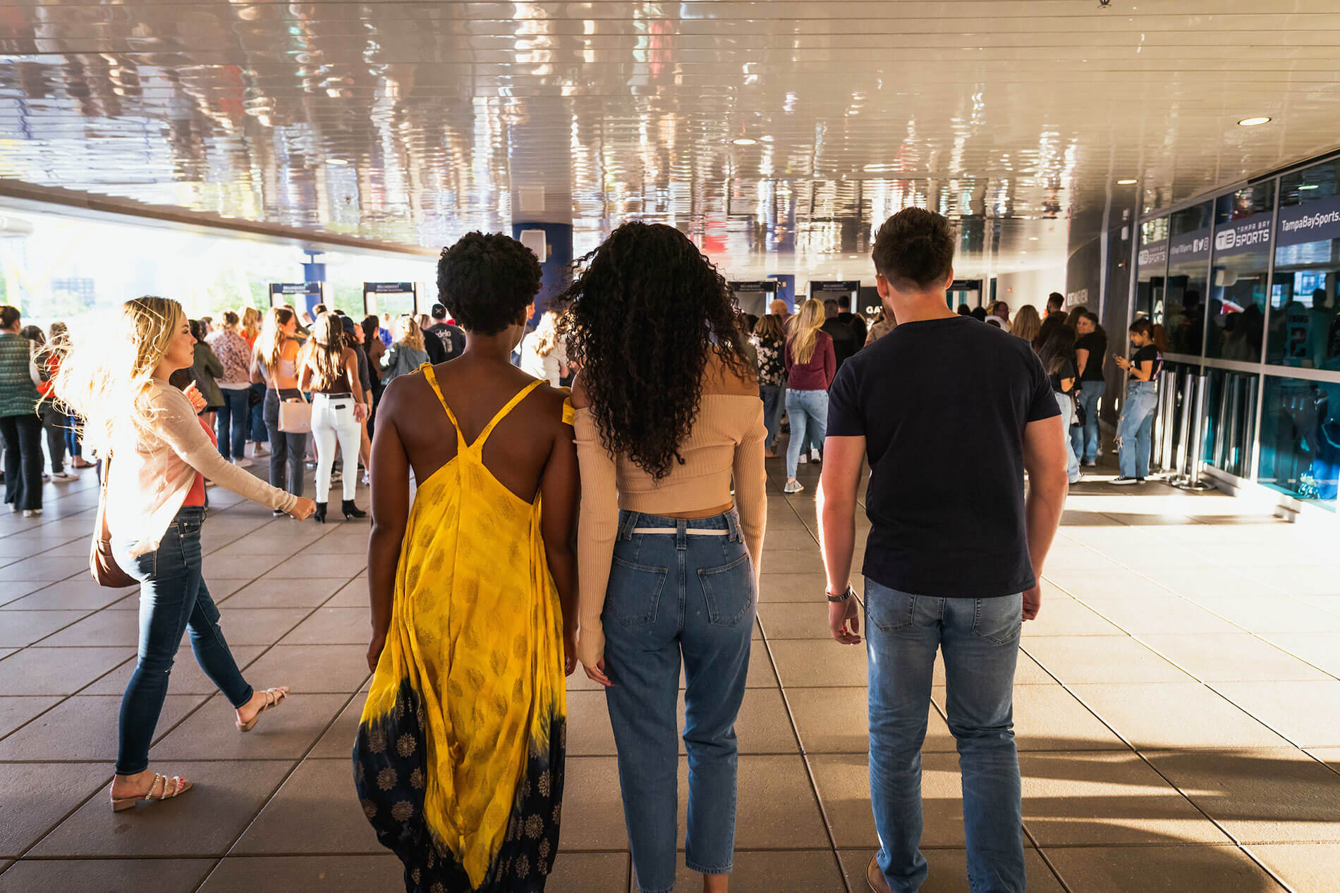 101 N. Meridian three friends walking into amalie arena