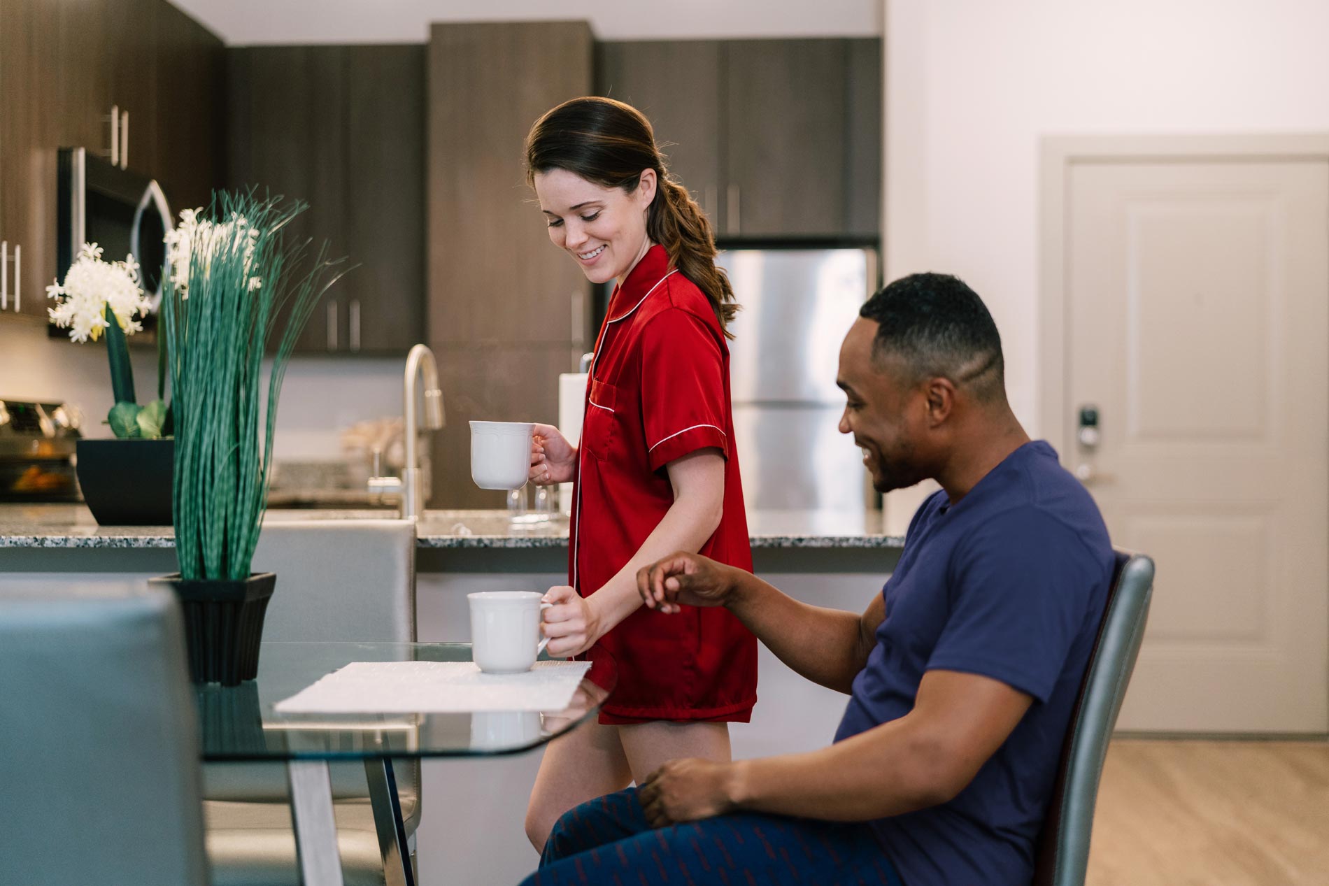 1274 At Towson Apartment Woman Bringing Coffee to Man