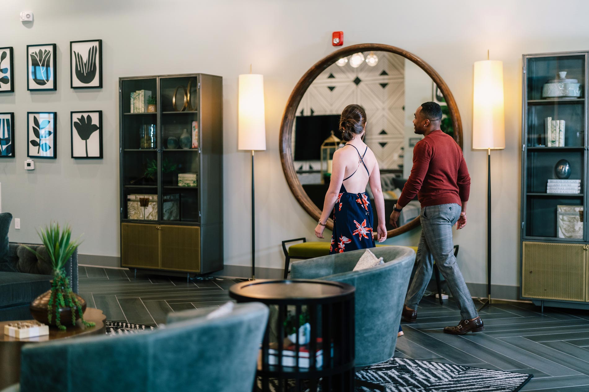 1274 At Towson Apartments Man and Woman Walking in Clubhouse