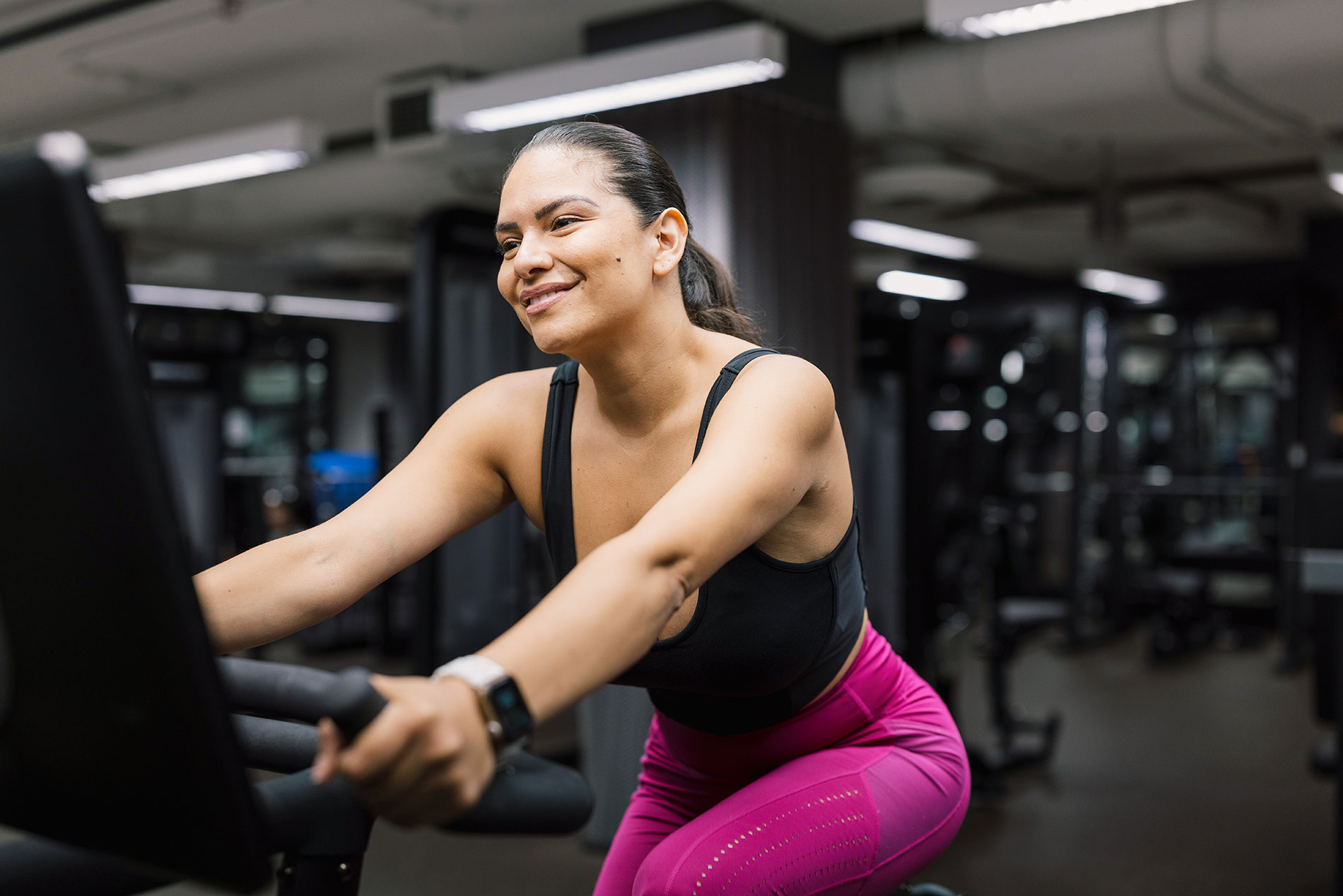 1301 Thomas Circle woman rides stationary bike