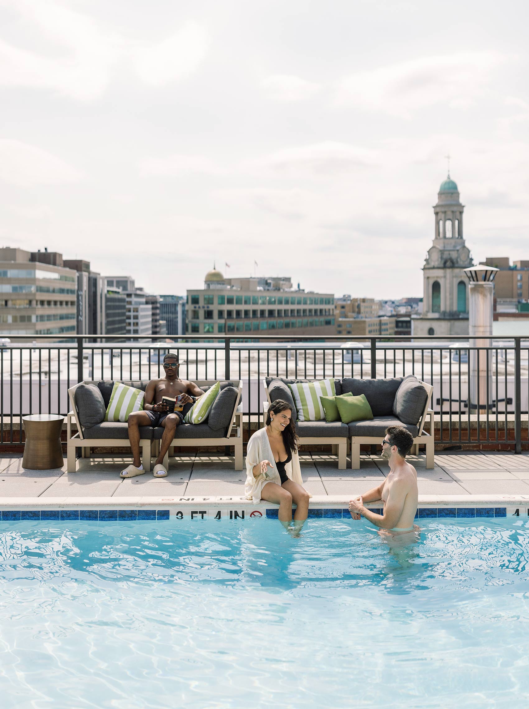 130 Thomas Circle man and woman in pool