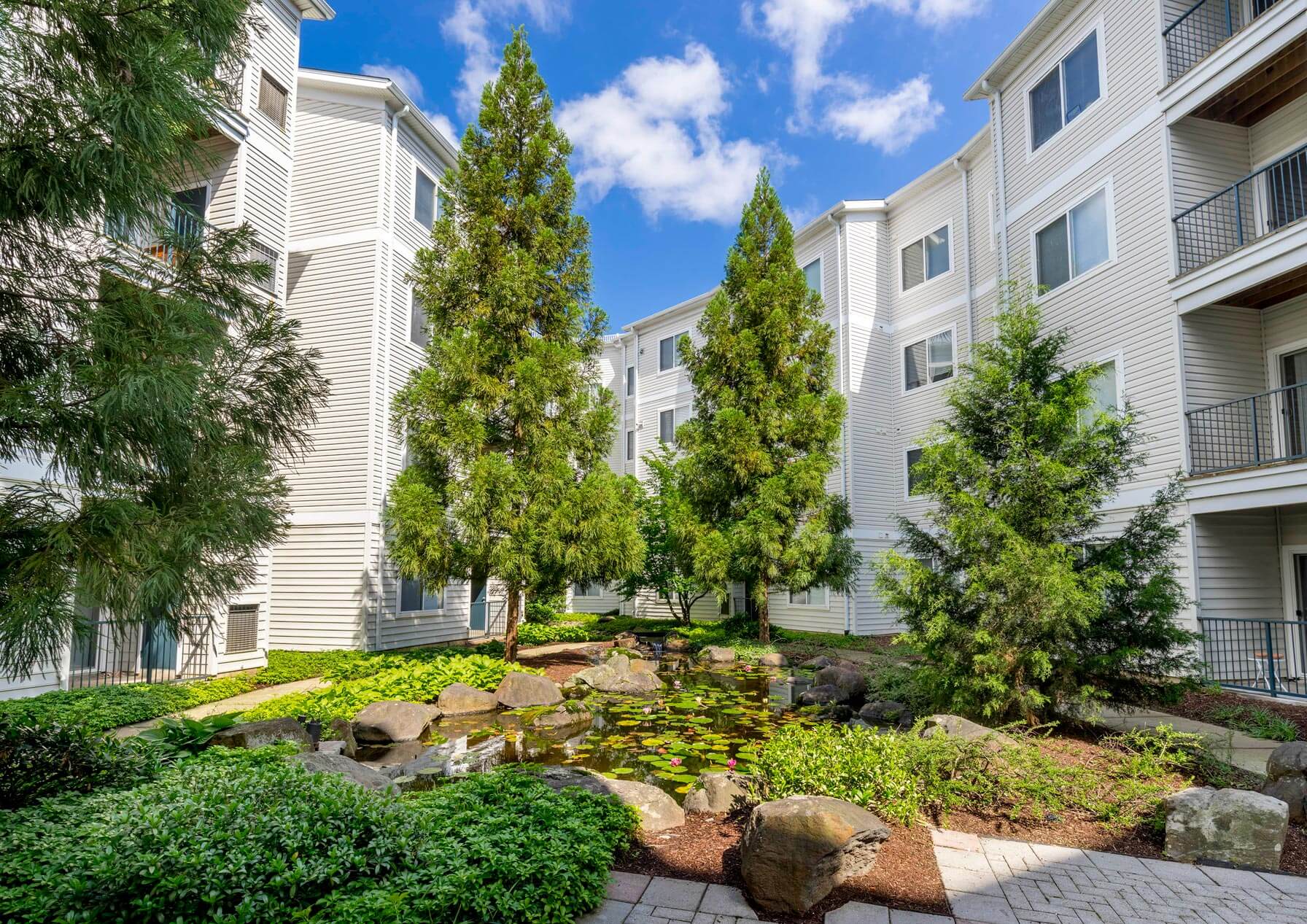 20 Lambourne building exterior pond