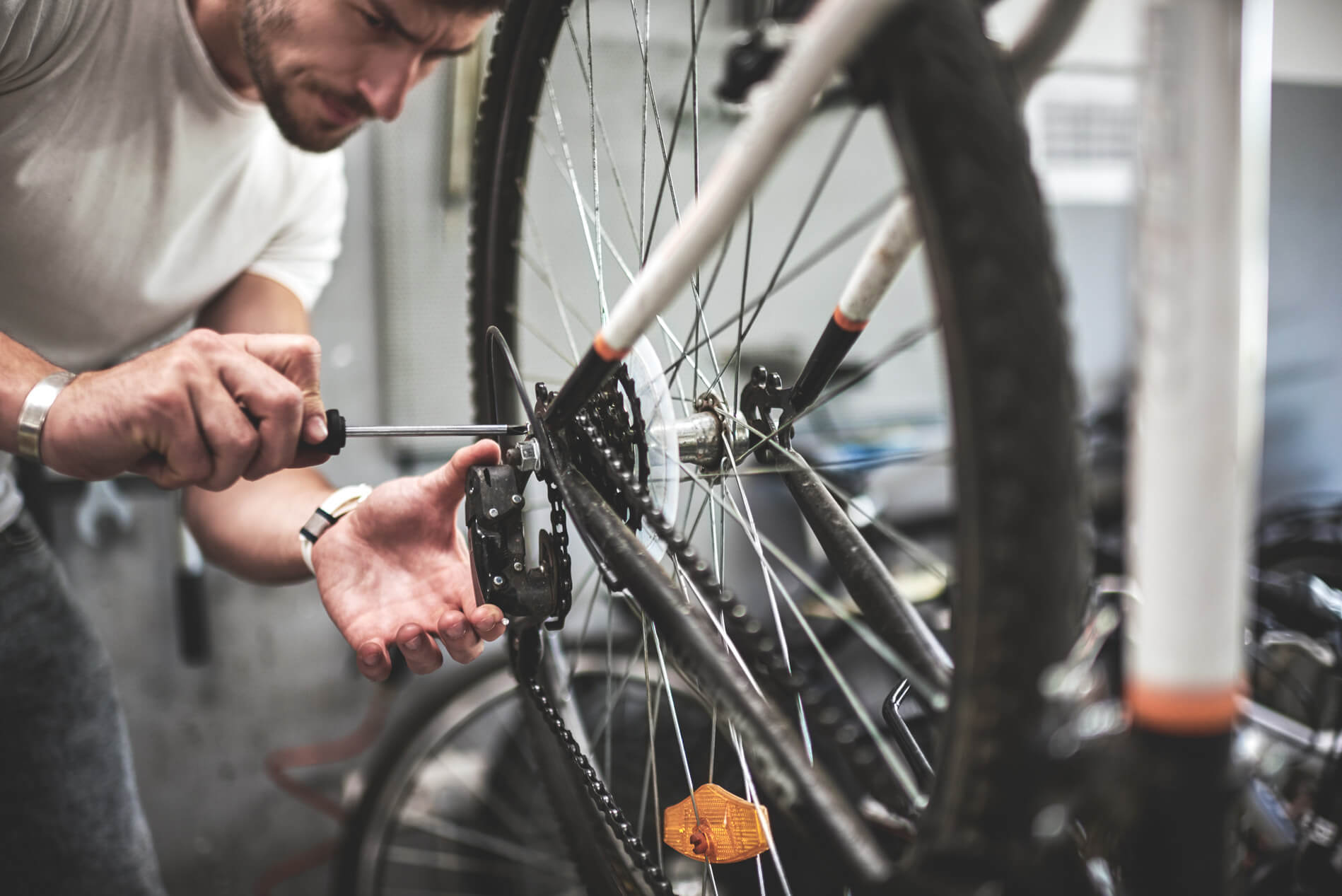 Man working on bike tire