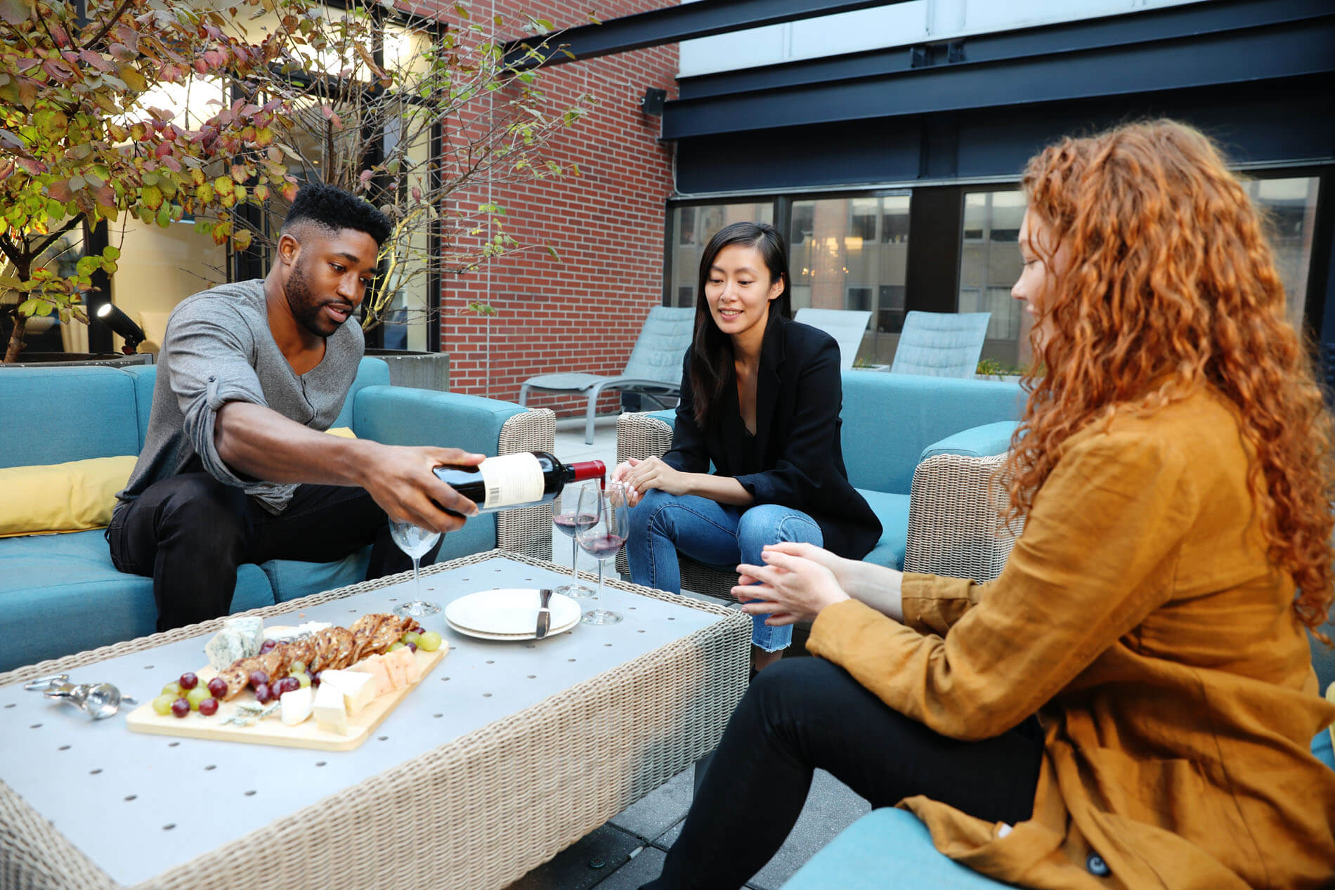 Friends on the rooftop lounge