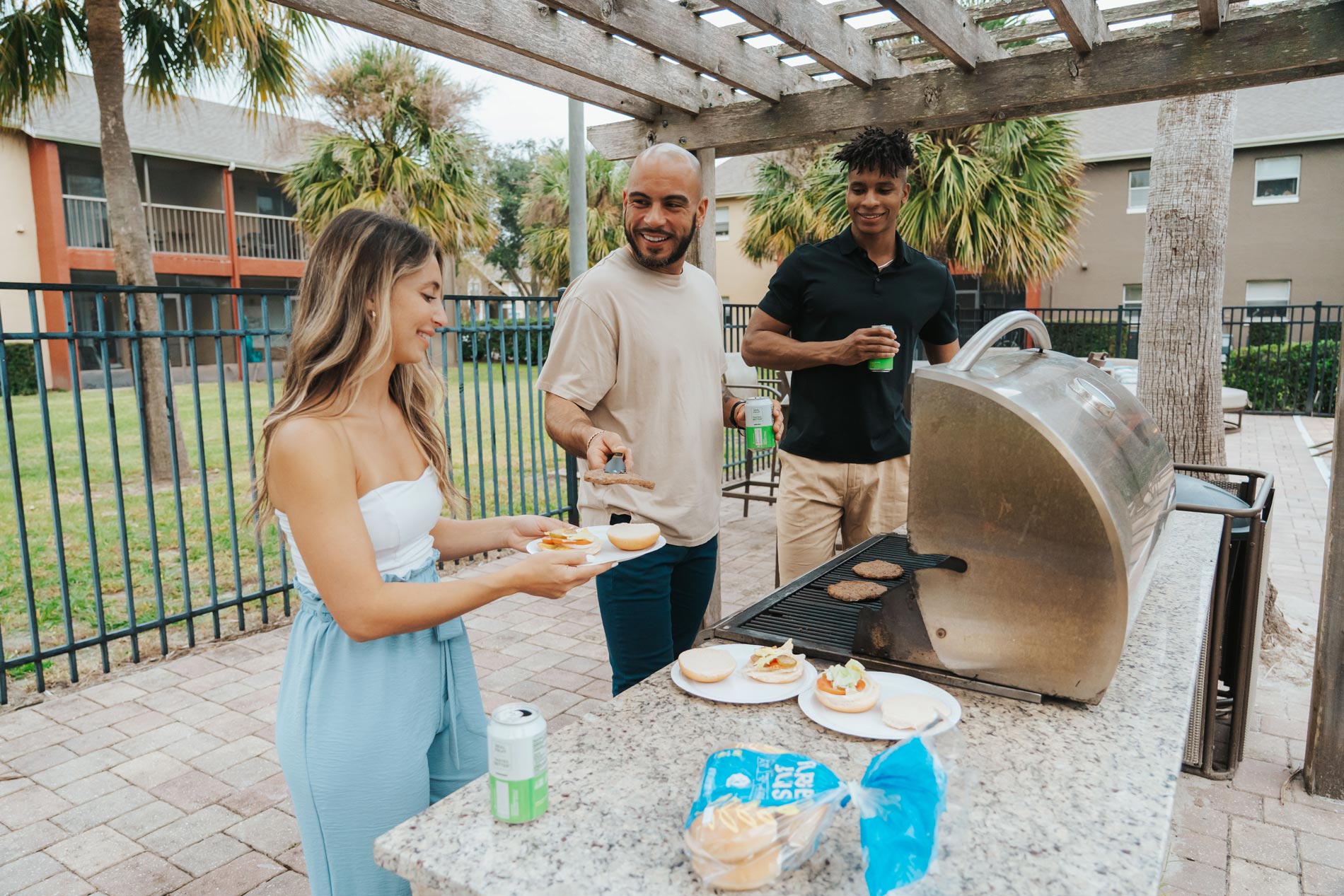 alafaya woods three people grill food