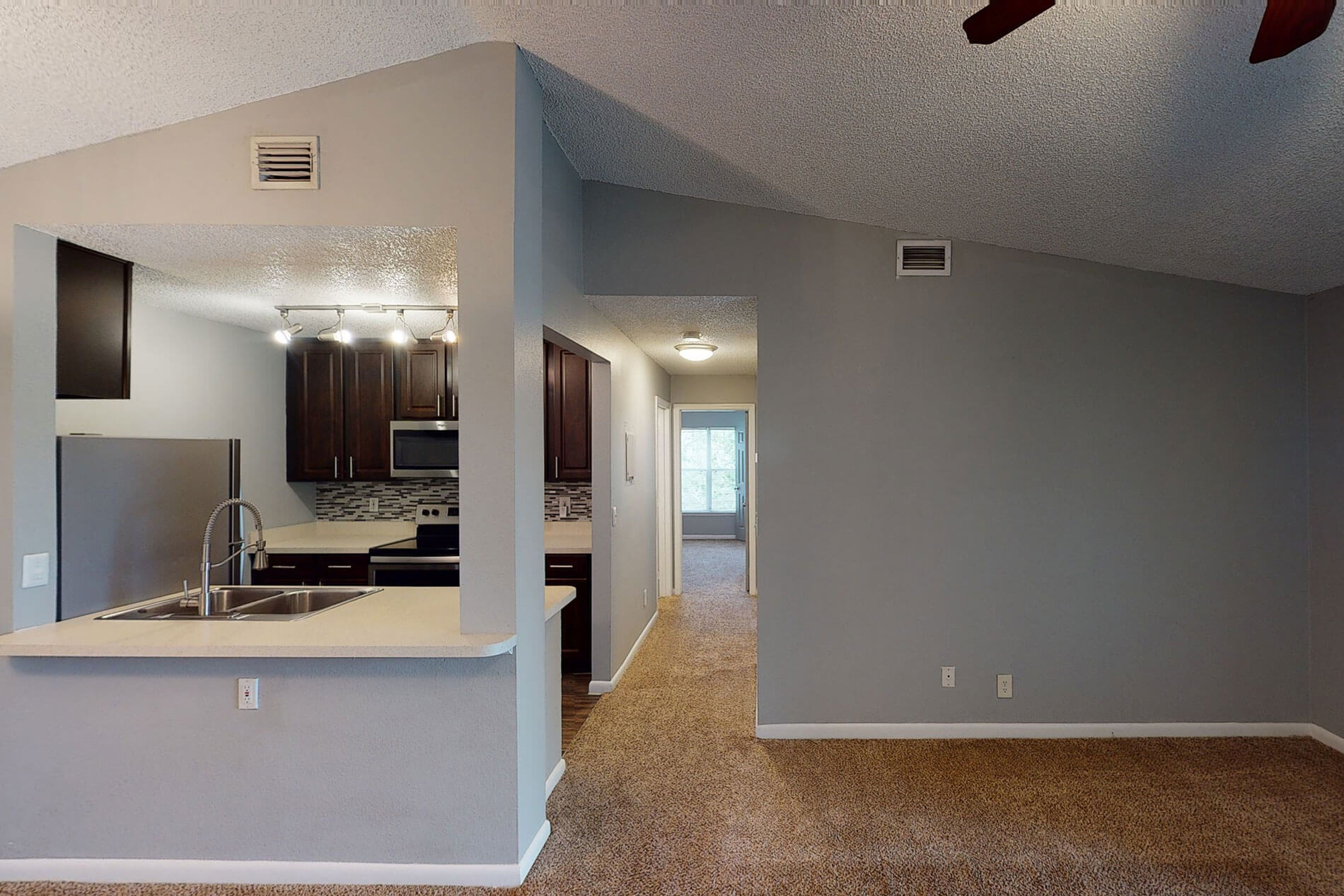 Altamira Place apartment kitchen and living room