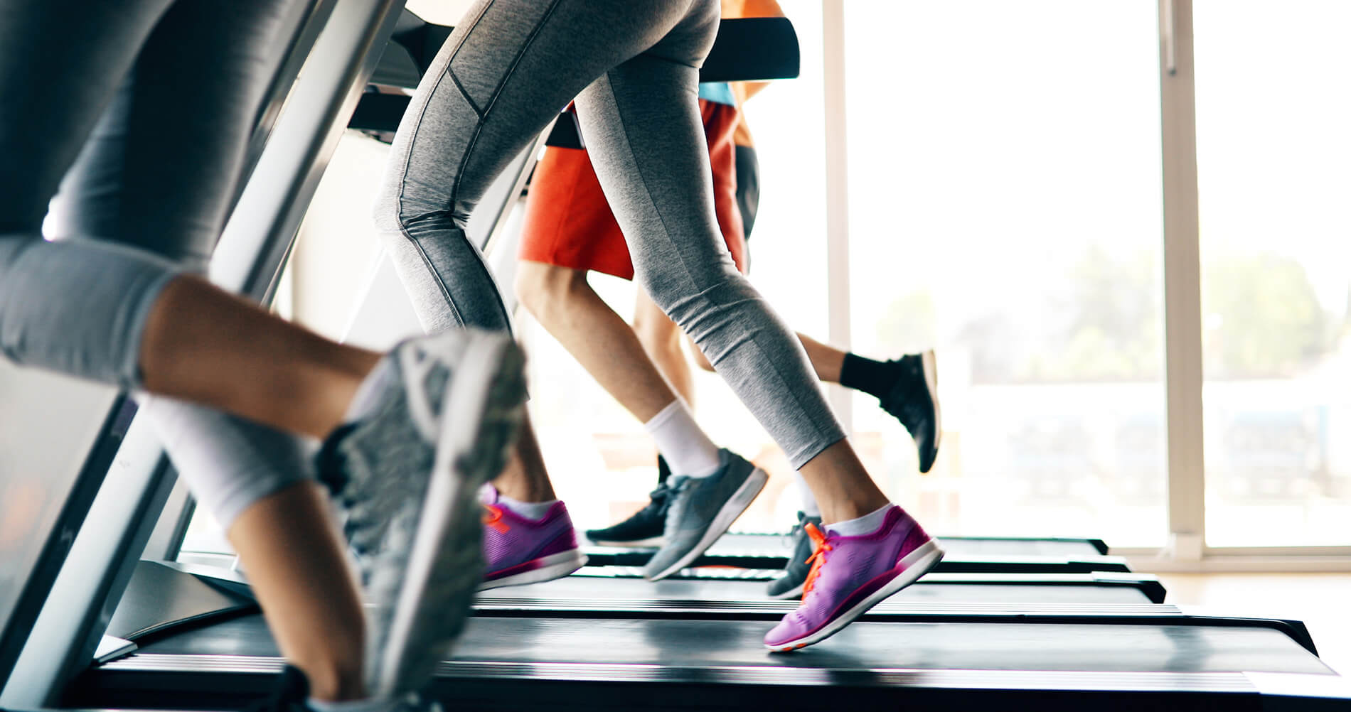 People running on treadmill