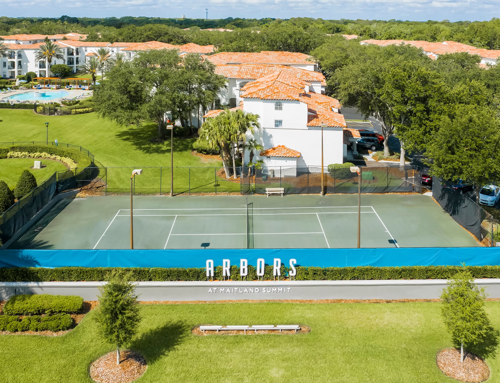 Arbors at Maitland Summit Tennis court aerial view