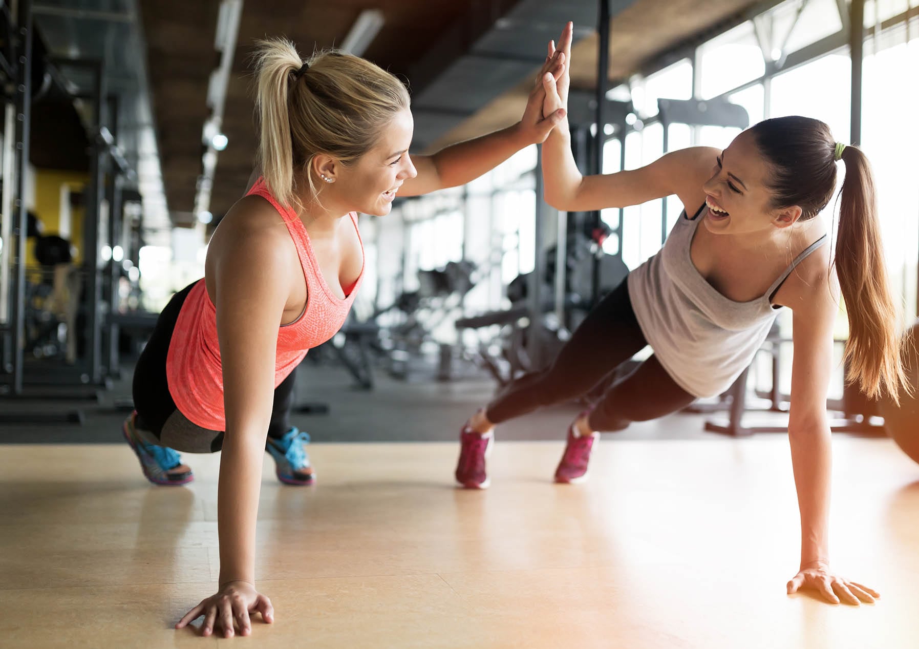 two women working out in studio