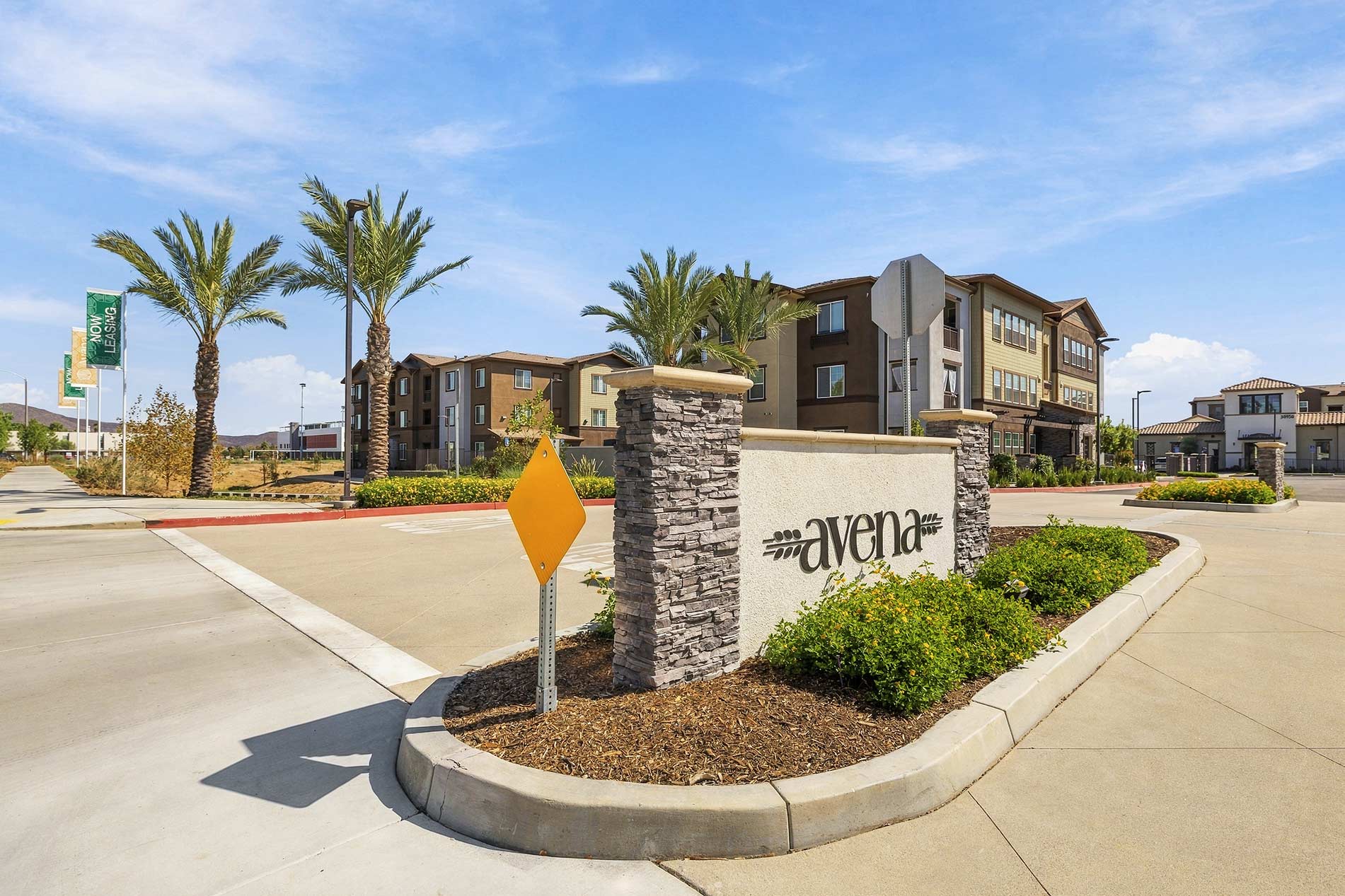 Avena monument sign and building exterior