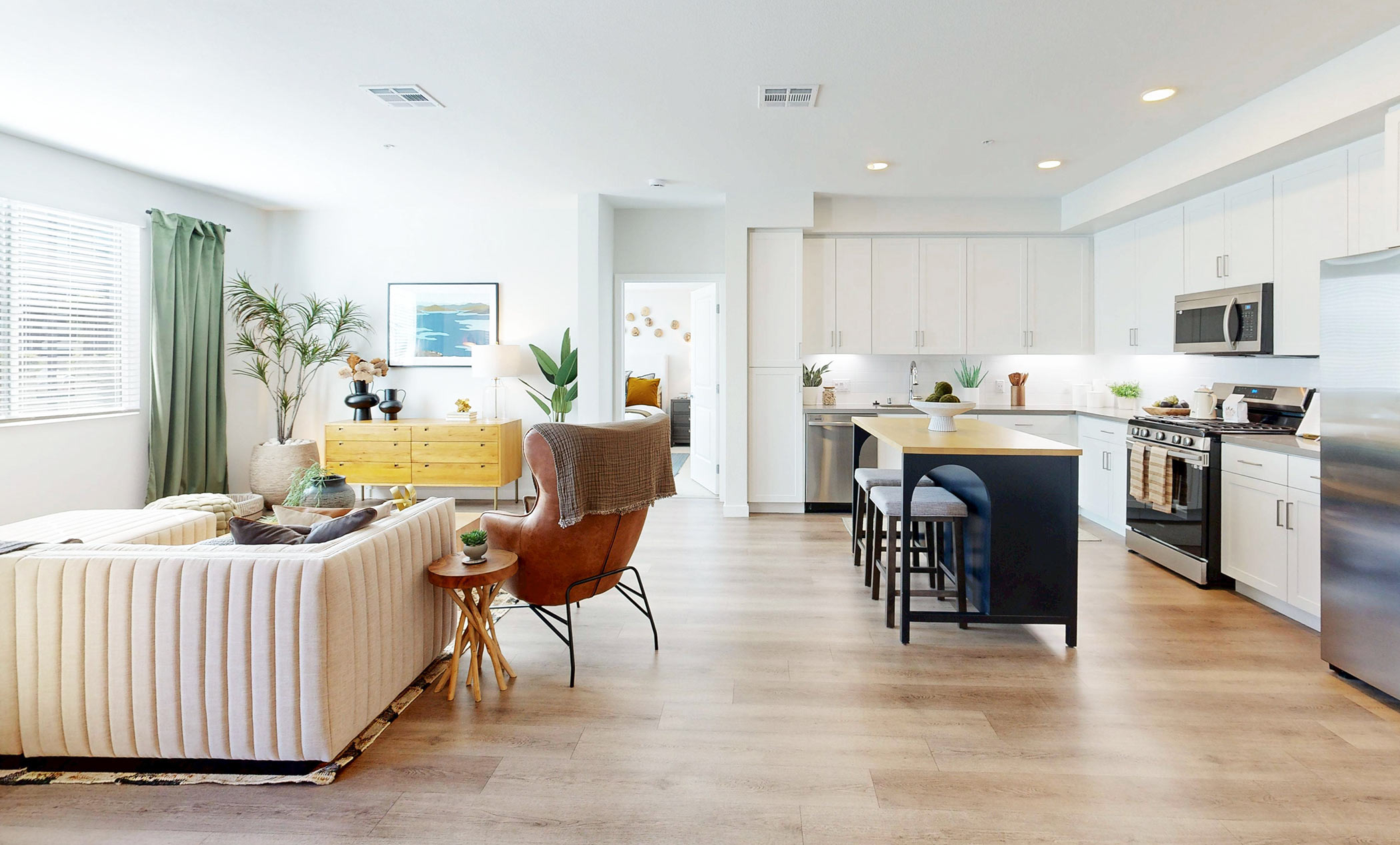Avena apartments staged living room and kitchen