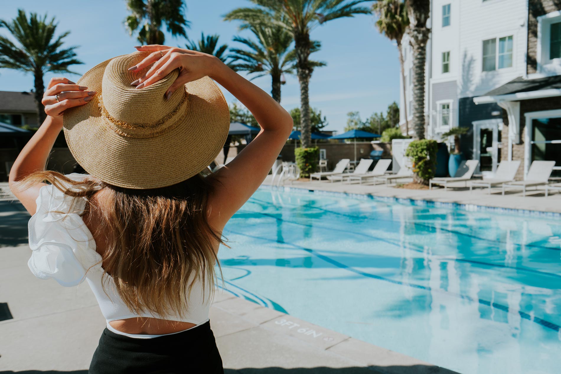 Beach and Ocean woman by pool