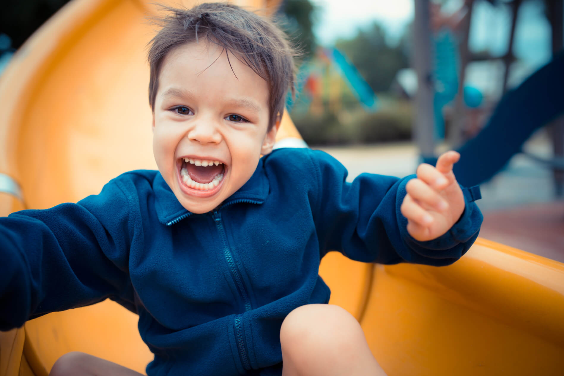 Kid on slide