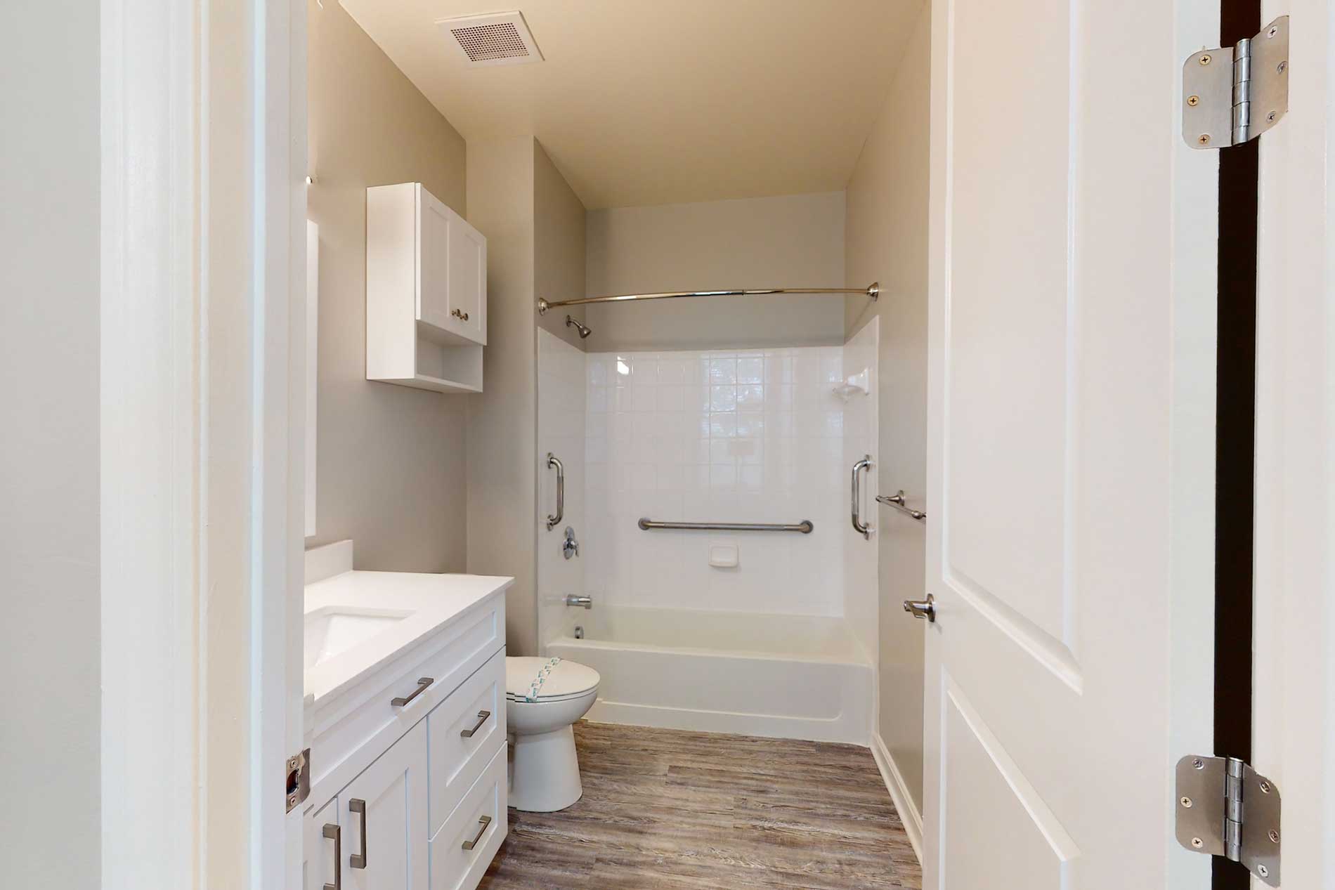 Bradlee Danvers bright white apartment bathroom