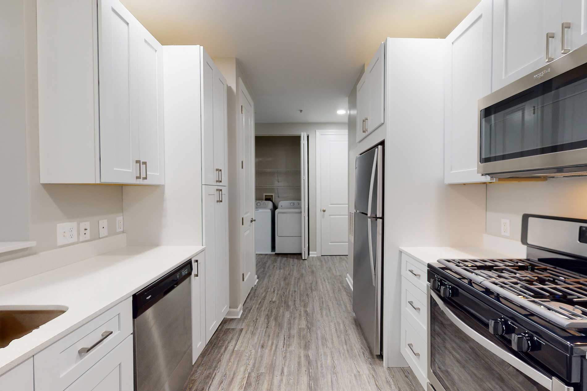 Bradlee Danvers bright white apartment kitchen