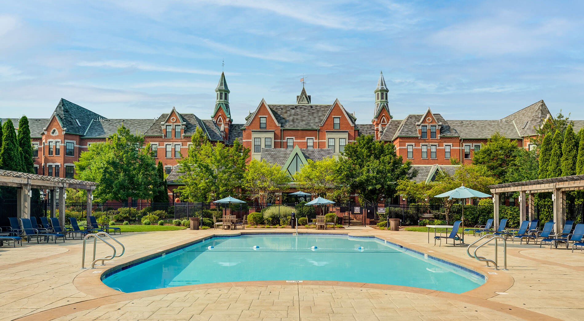 Bradlee Danvers swimming pool with building in the background