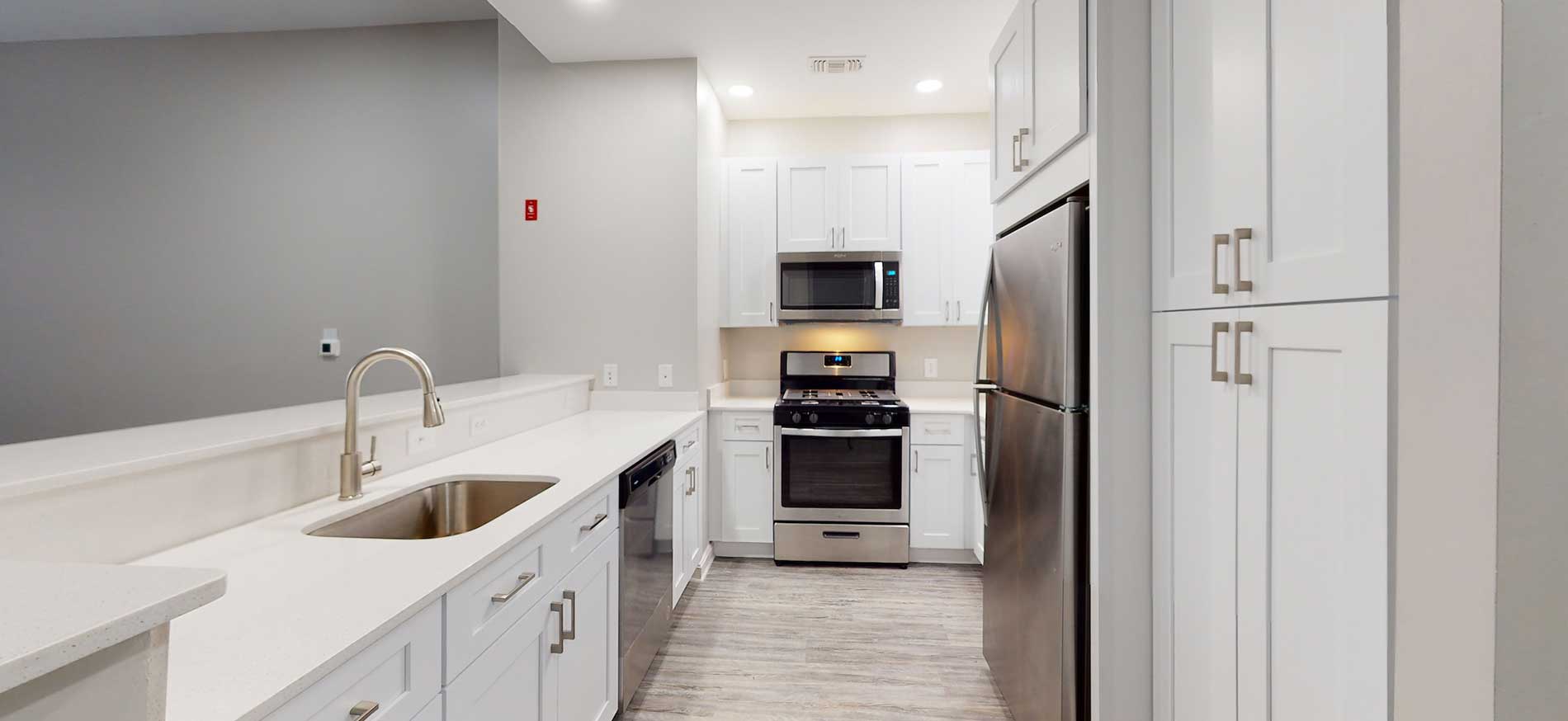 Bradlee Danvers bright white apartment kitchen