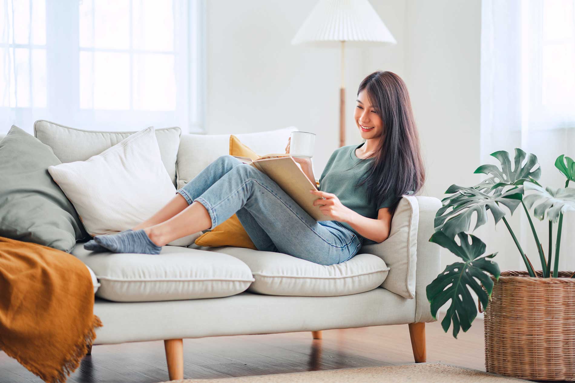 Woman lounging on couch