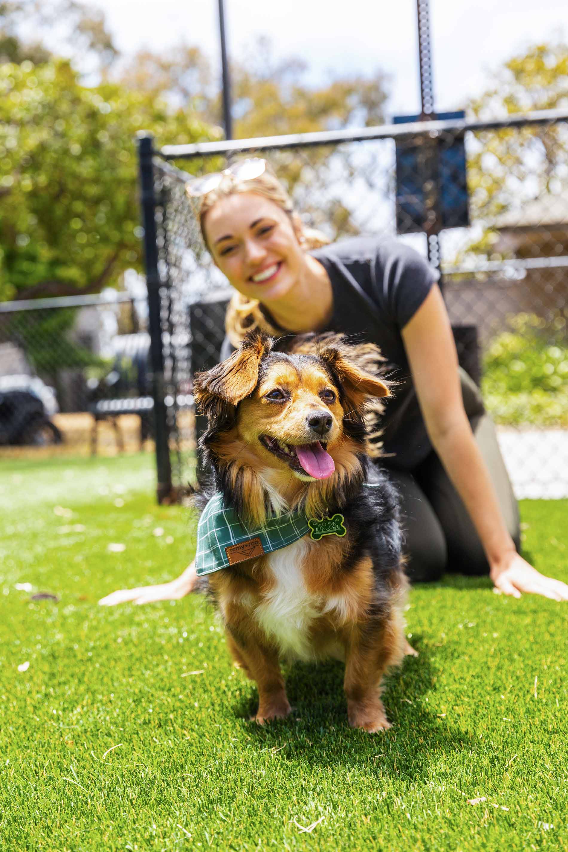 Woman with dog in dog park