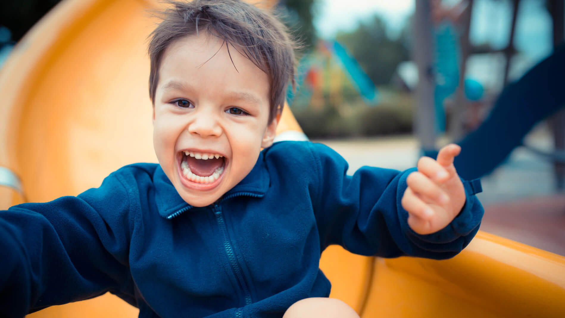 Kid playing on playground