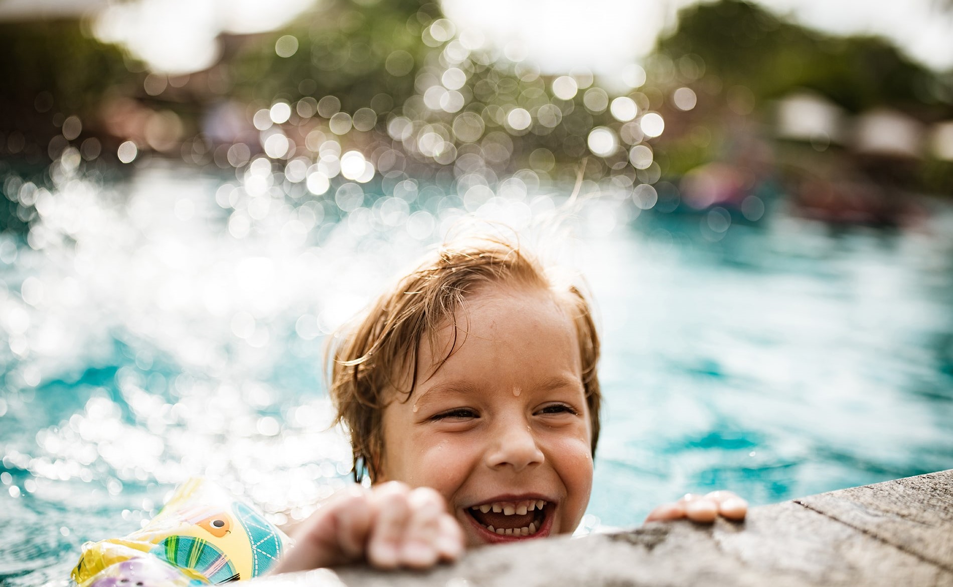 young boy at swimming pool