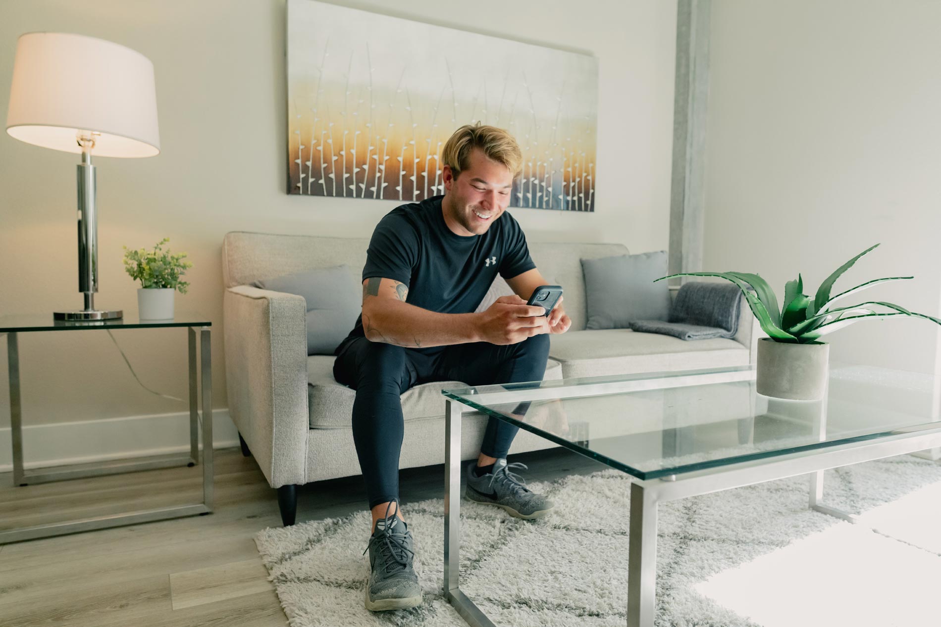 Channel Mission Bay man sitting on couch in living room