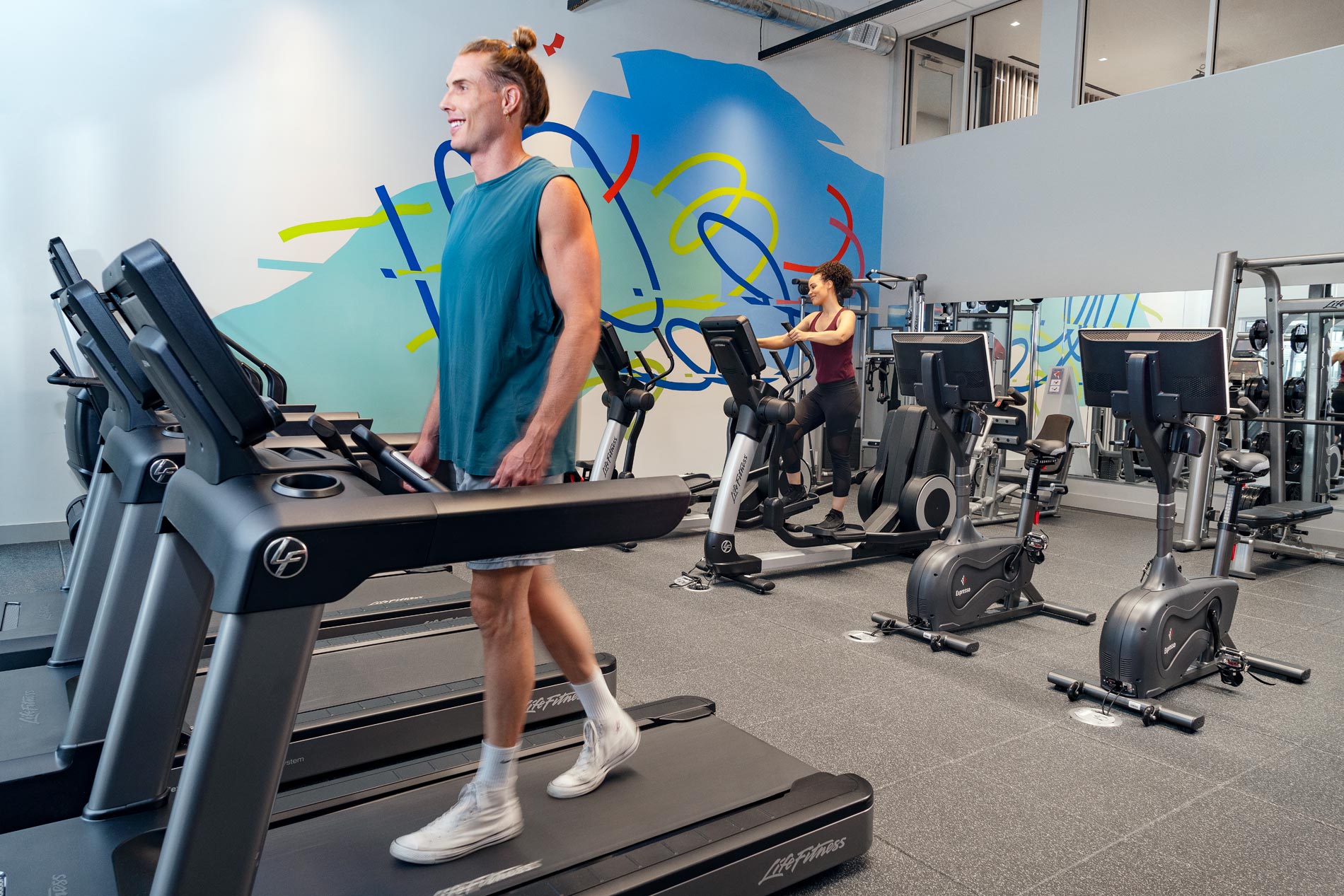 Cirrus Apartments Man on Treadmill