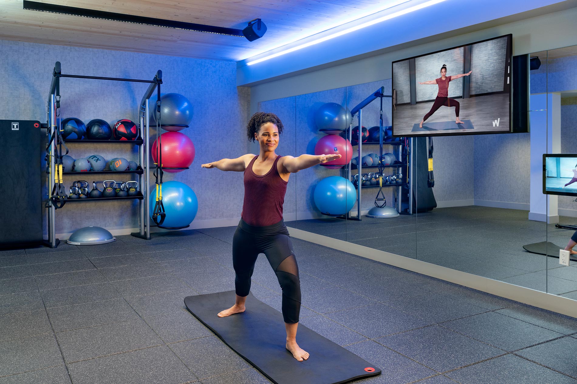 Cirrus Apartments Woman Does Yoga