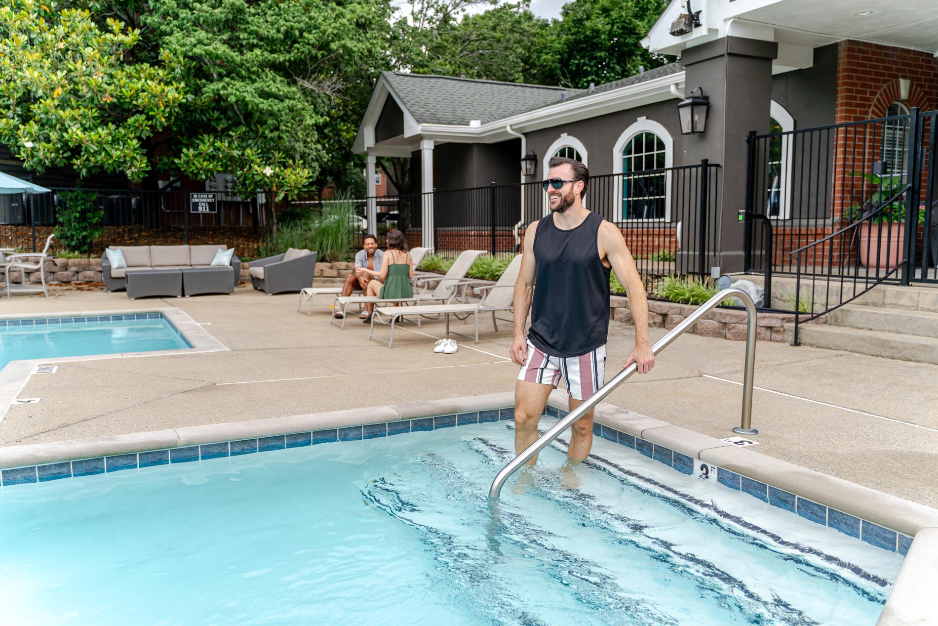 Colonnade man walks into pool