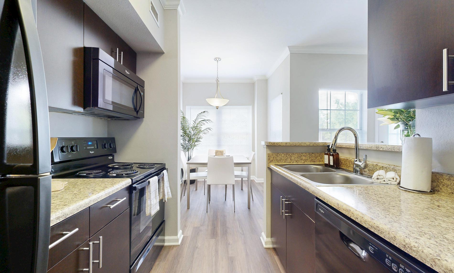 The Colonnade staged kitchen and dining room