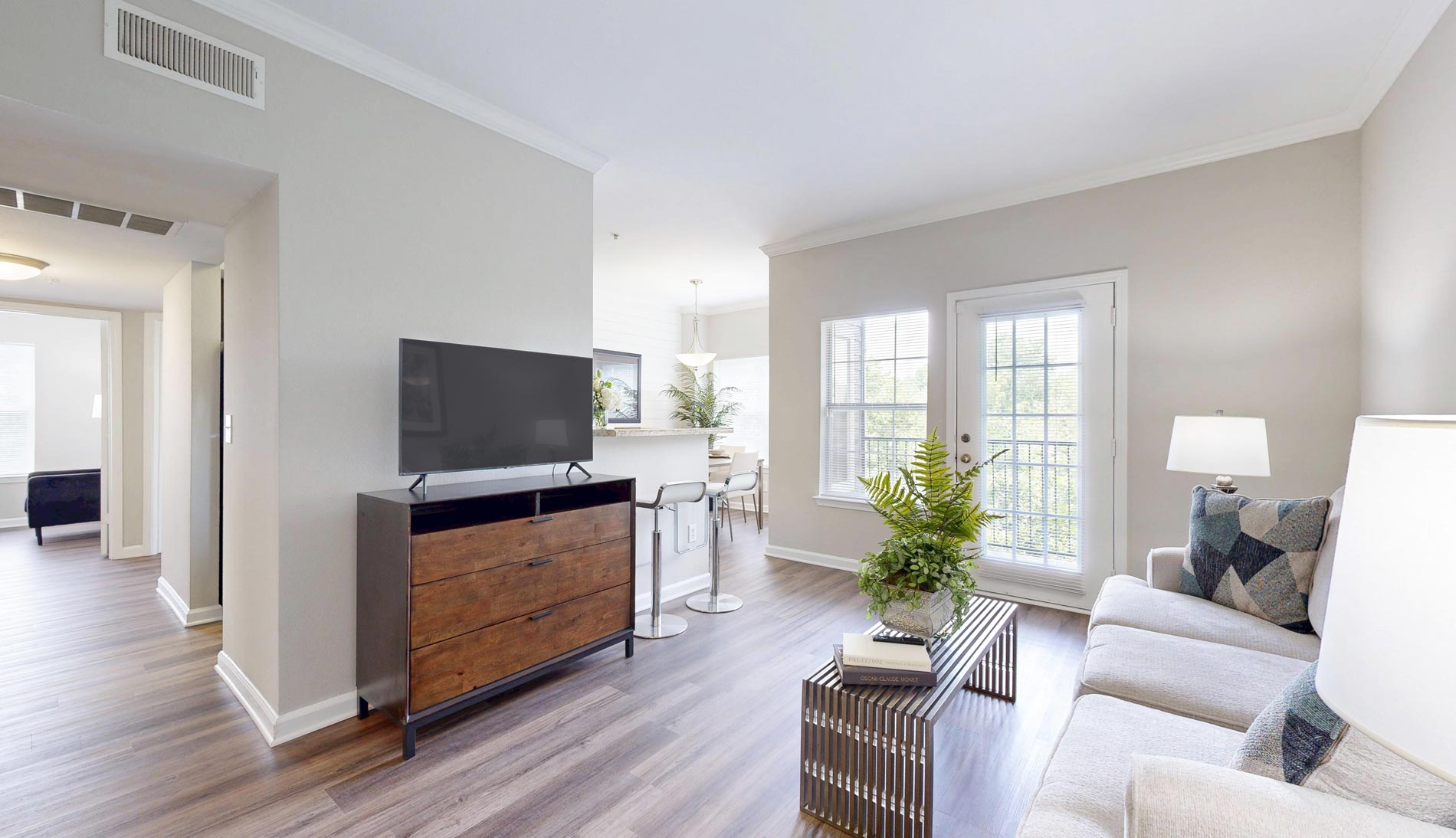 The Colonnade staged living and dining room