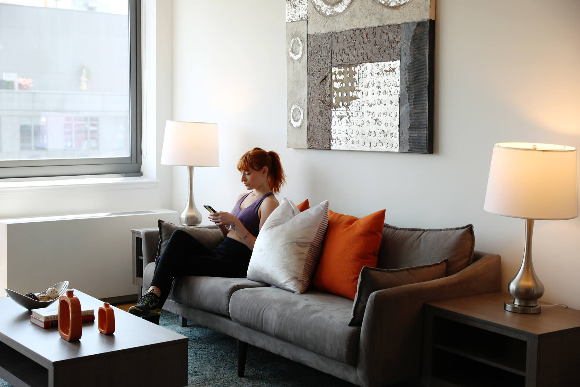 Woman sitting on couch