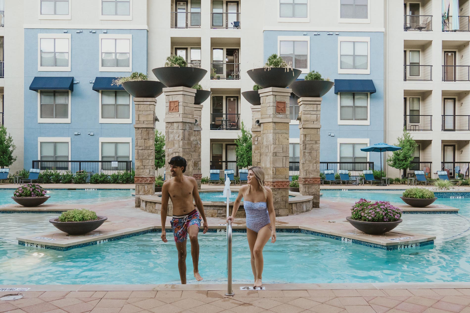 Cool Springs man and woman get out of the pool