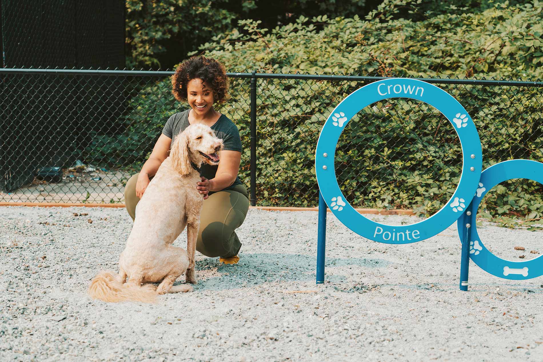 Crown Pointe woman with dog in dog park