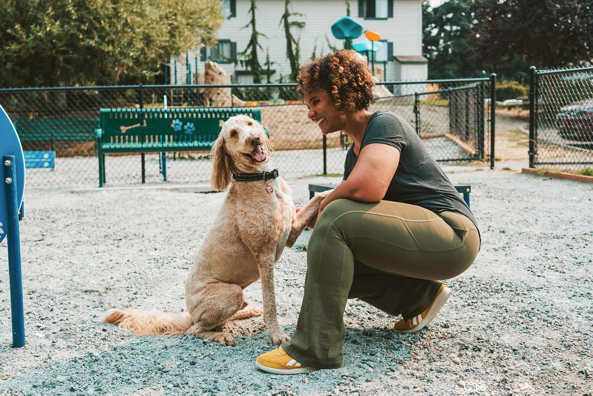Crown Pointe woman and dog in dog park