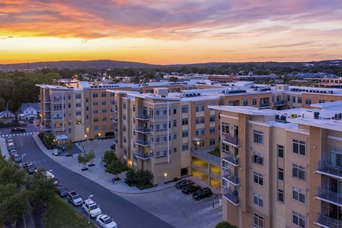Currents on the Charles apartments at dusk