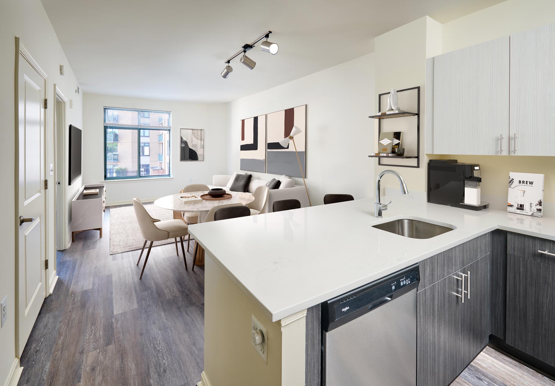 Delancey at Shirlington Village staged kitchen and living room