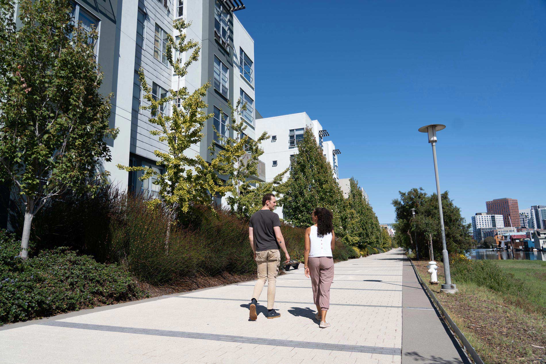 Edgewater couple walks by property