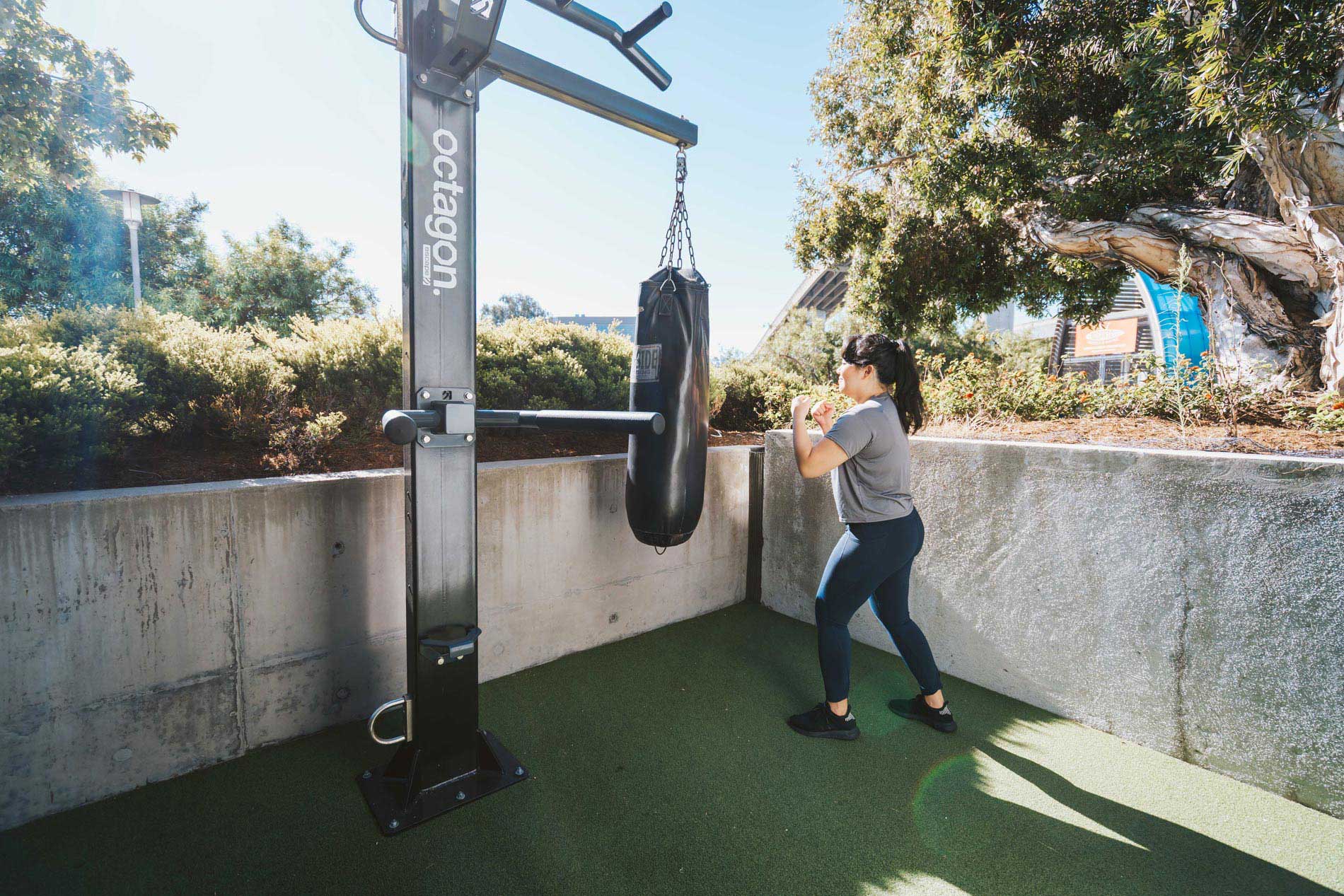 Edgewater woman boxes at outdoor fitness area