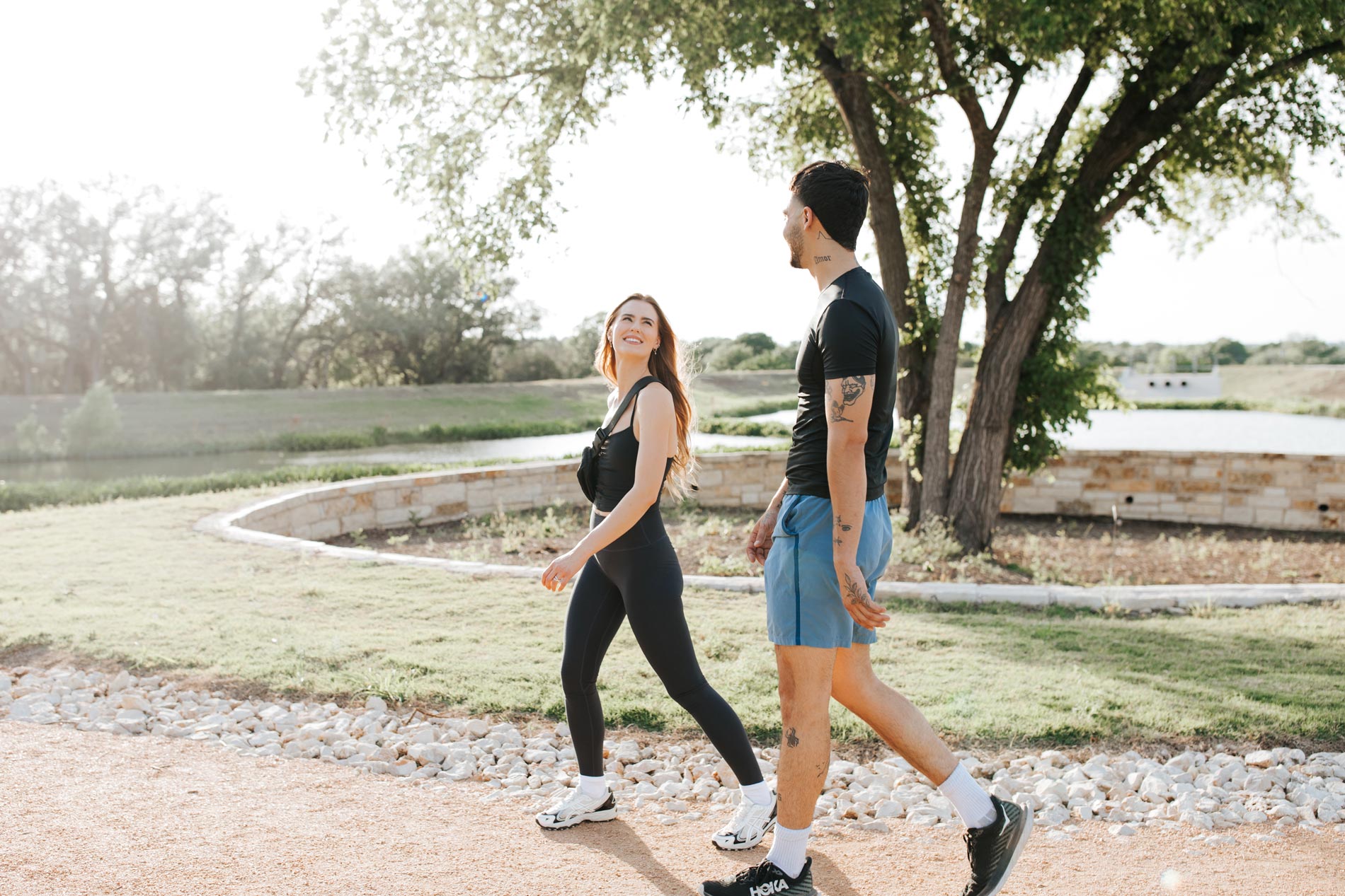 Estancia Villas man and woman walk a trail