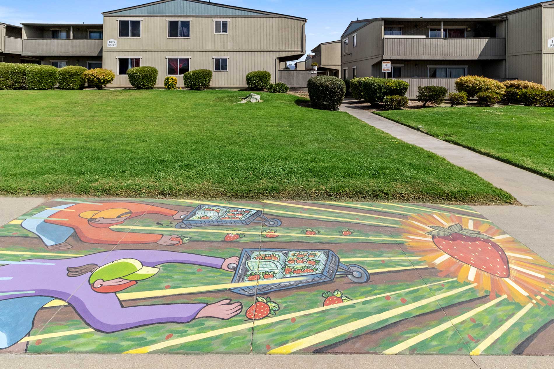 Garden Court sidewalk art and building exterior