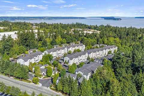 Hearthstone at Merrill Creek apartments located in Everett neighborhood of Seattle features updated interiors, outdoor amenities, and is surrounded by beautiful greenery