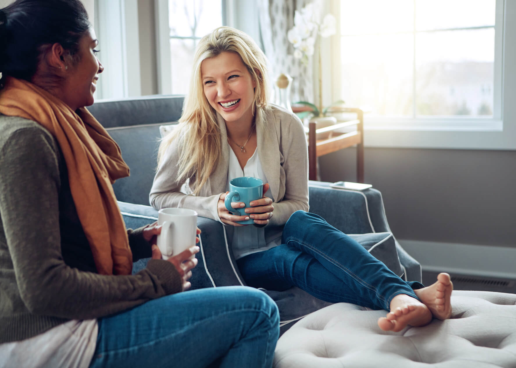 Friends talking on couch