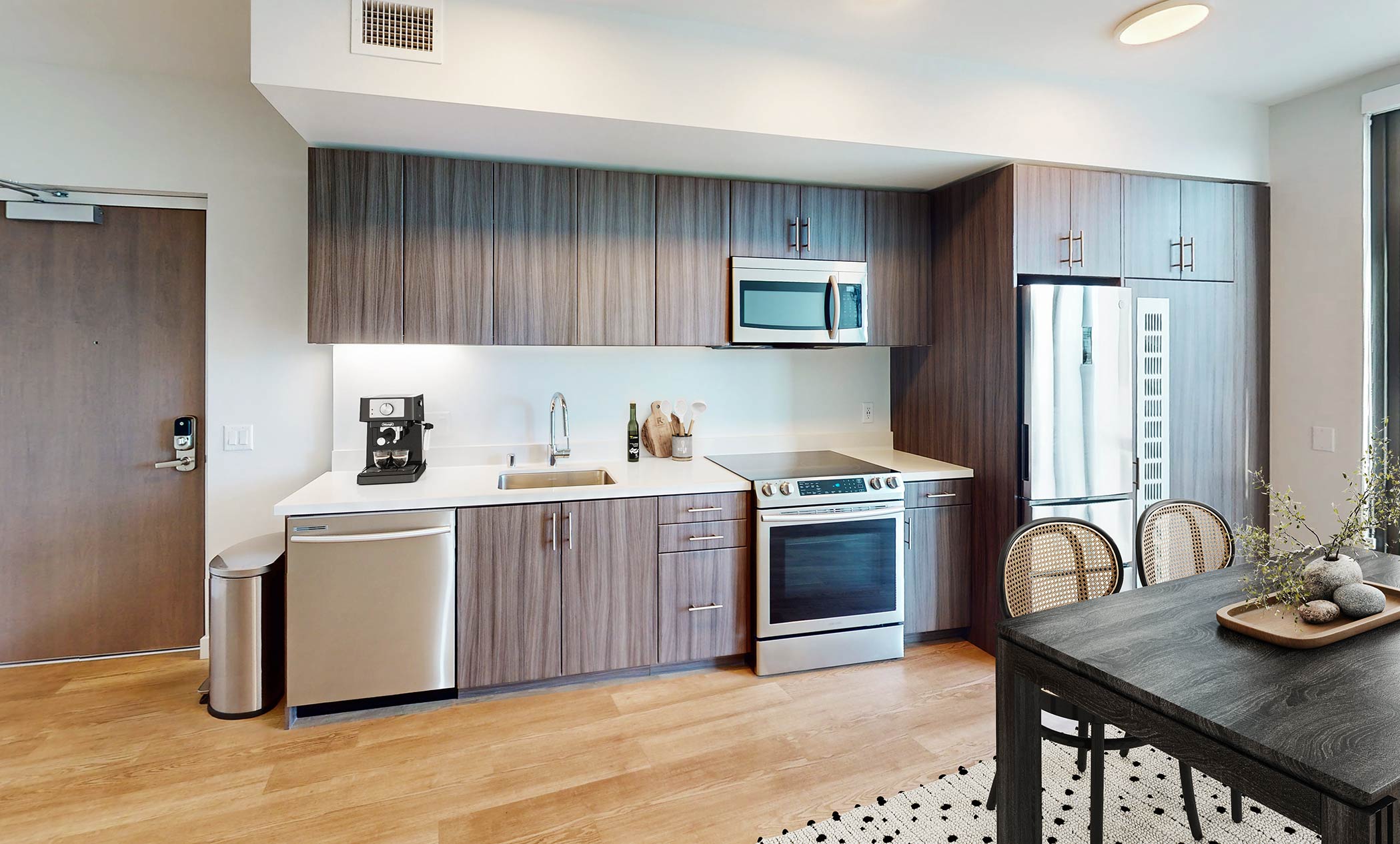 HQ apartments staged kitchen and dining room