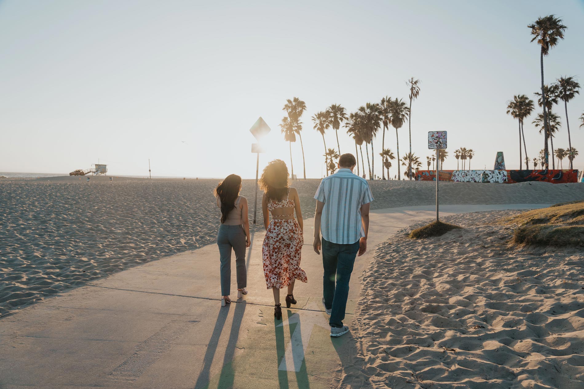 Jefferson three people walk by beach