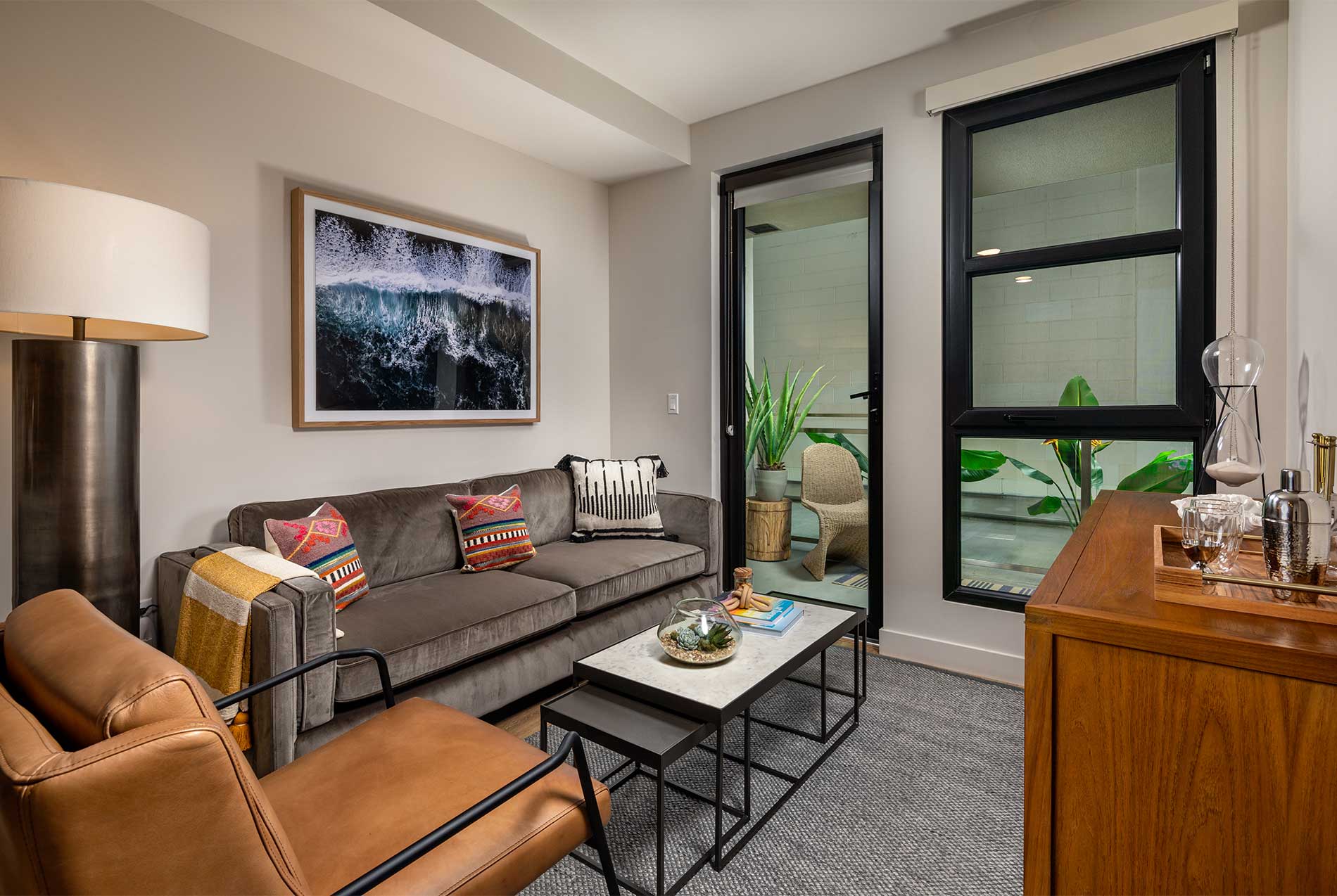 Stylish Santa Monica apartment living area with wood plank flooring