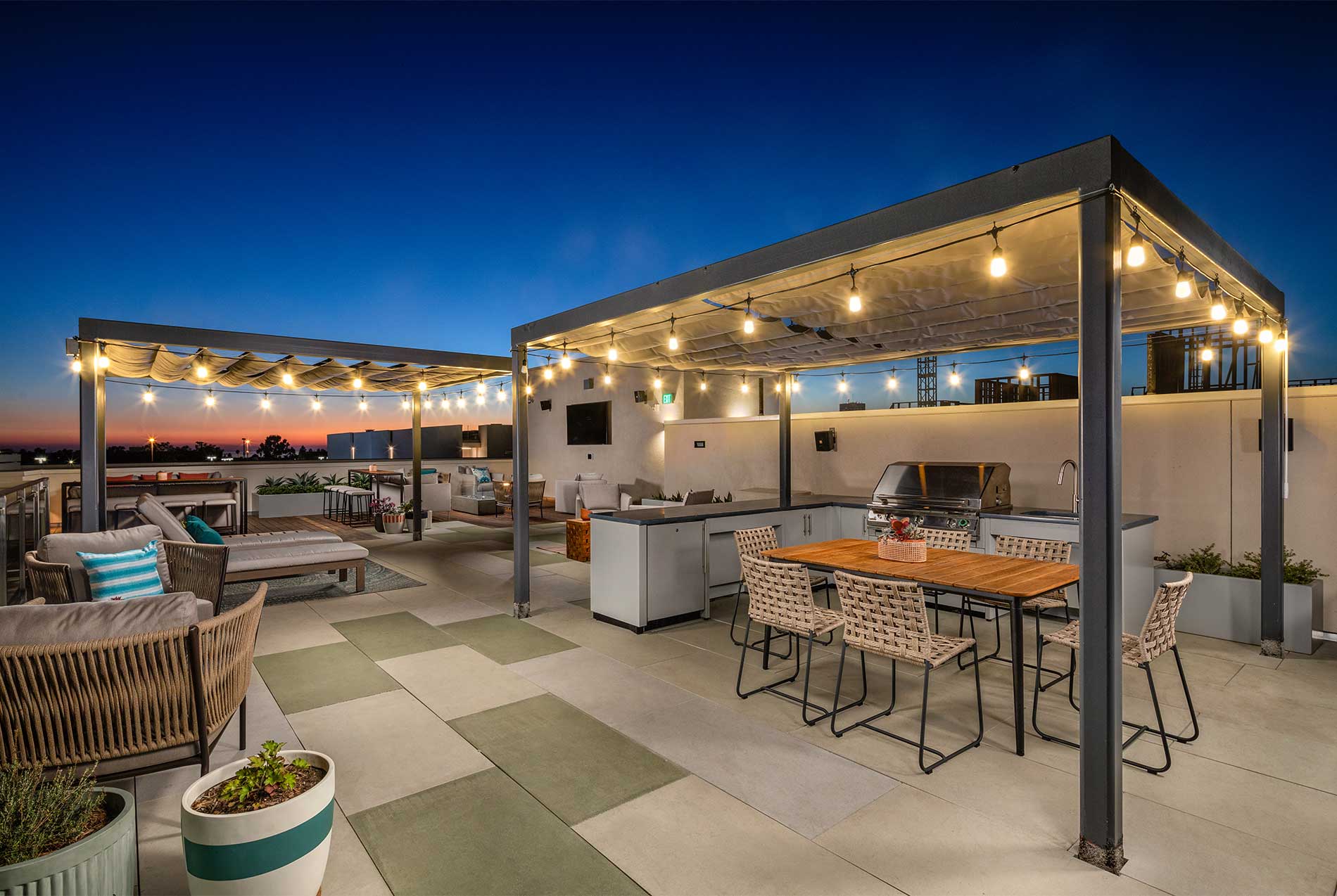 Rooftop lounge at Junction Santa Monica with cabanas and outdoor seating